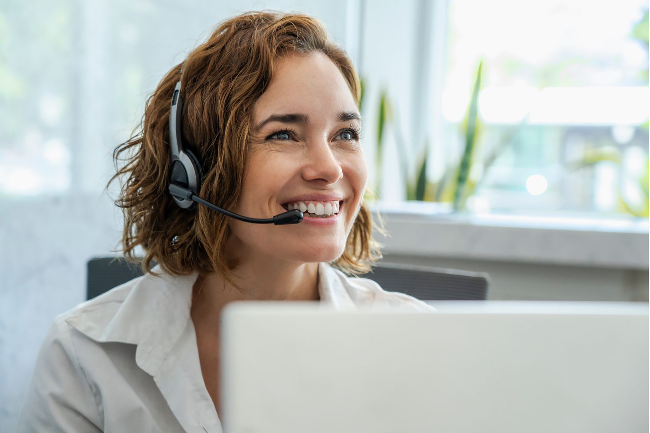Virtual receptionist talking on a headset